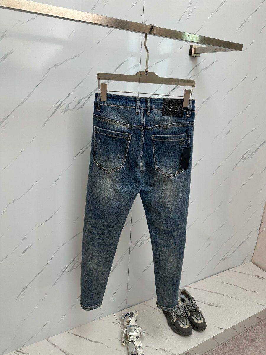 Jeans en denim délavé de marque pour hommes