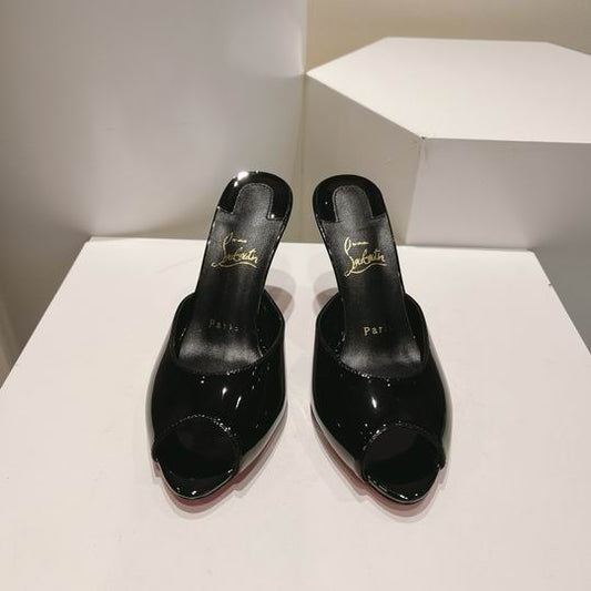 Mules noires à talons hauts et bout ouvert